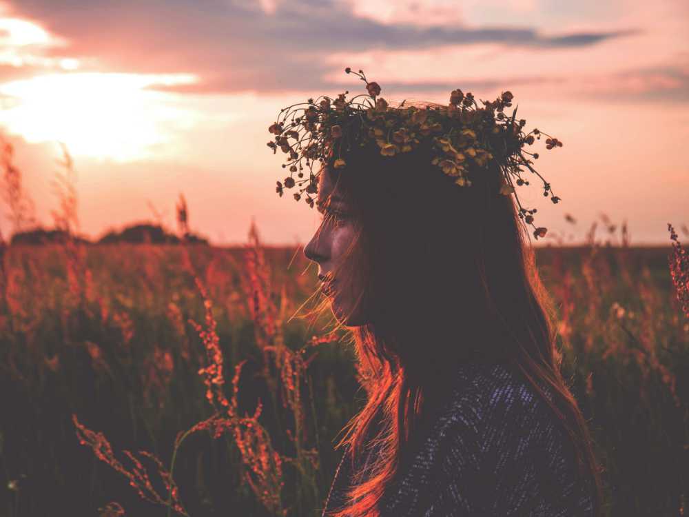 Find relief from migraines using traditional Chinese medicine Woman in outdoor setting