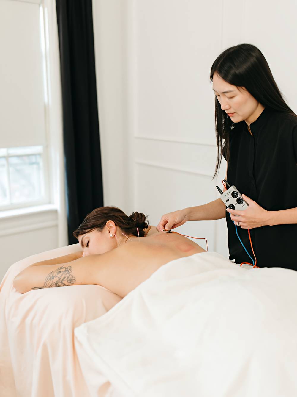 Acupuncture estim treatment at Cherry Blossom Healing Arts